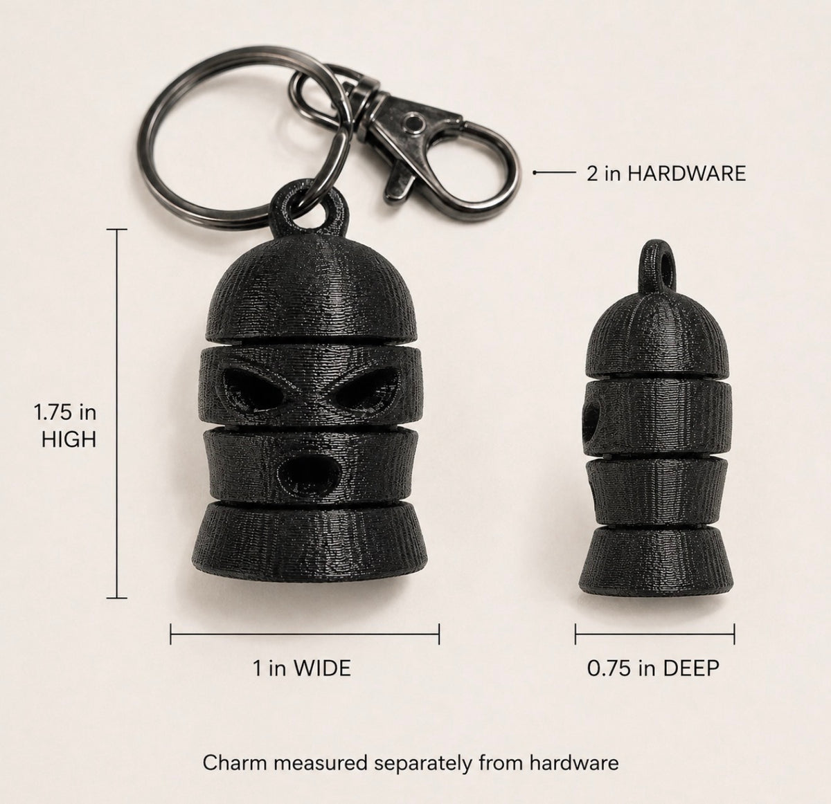 Articulated charm dimensions: 1.75 by 1 by 0.75 inches; hardware approximately 2 inches