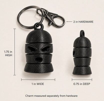 Articulated charm dimensions: 1.75 by 1 by 0.75 inches; hardware approximately 2 inches