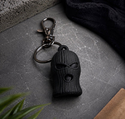 SOG ski mask keychain shown from an alternate angle