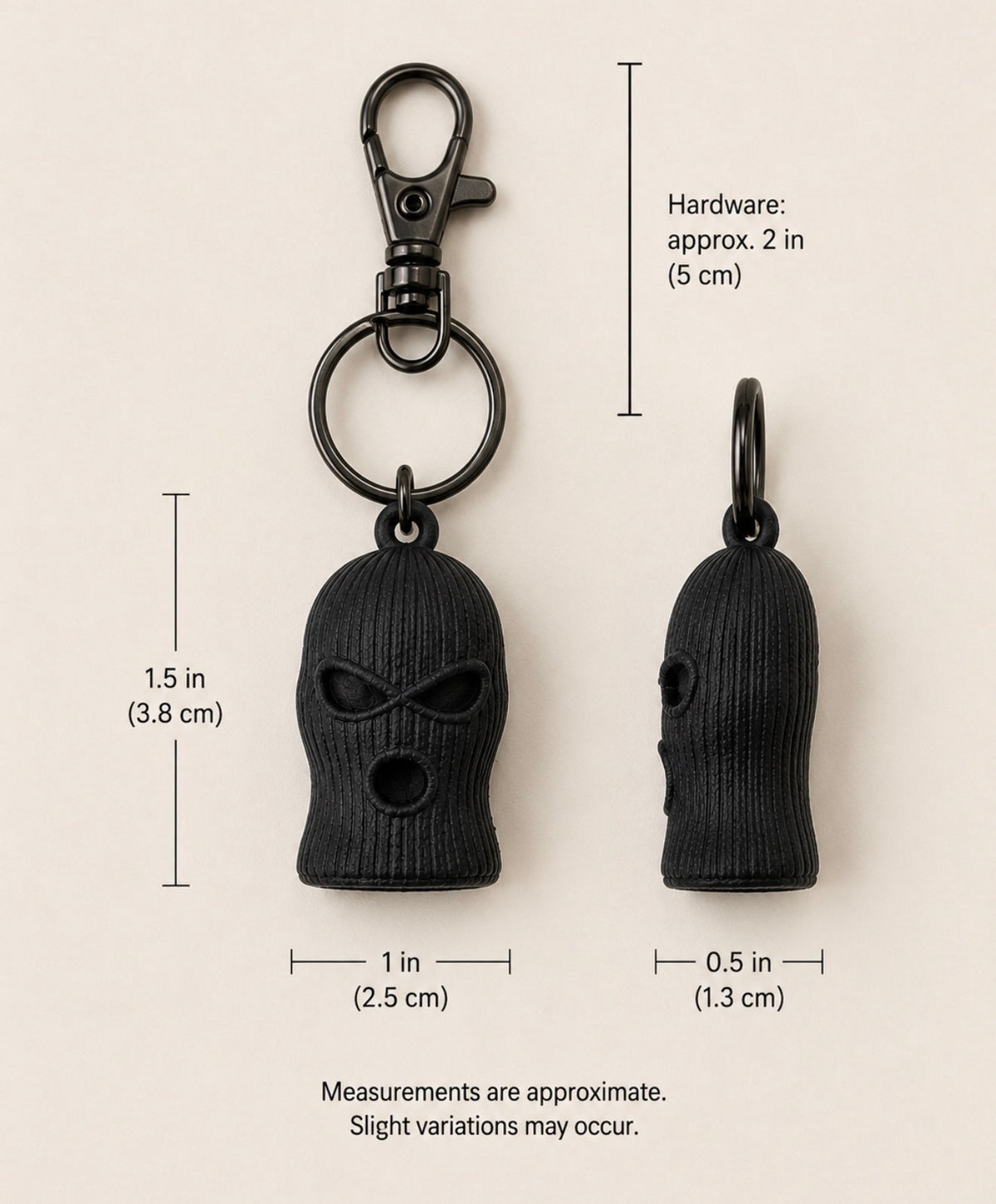 SOG charm dimensions: 1.5 by 1 by 0.5 inches; hardware approximately 2 inches