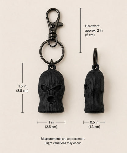 SOG charm dimensions: 1.5 by 1 by 0.5 inches; hardware approximately 2 inches